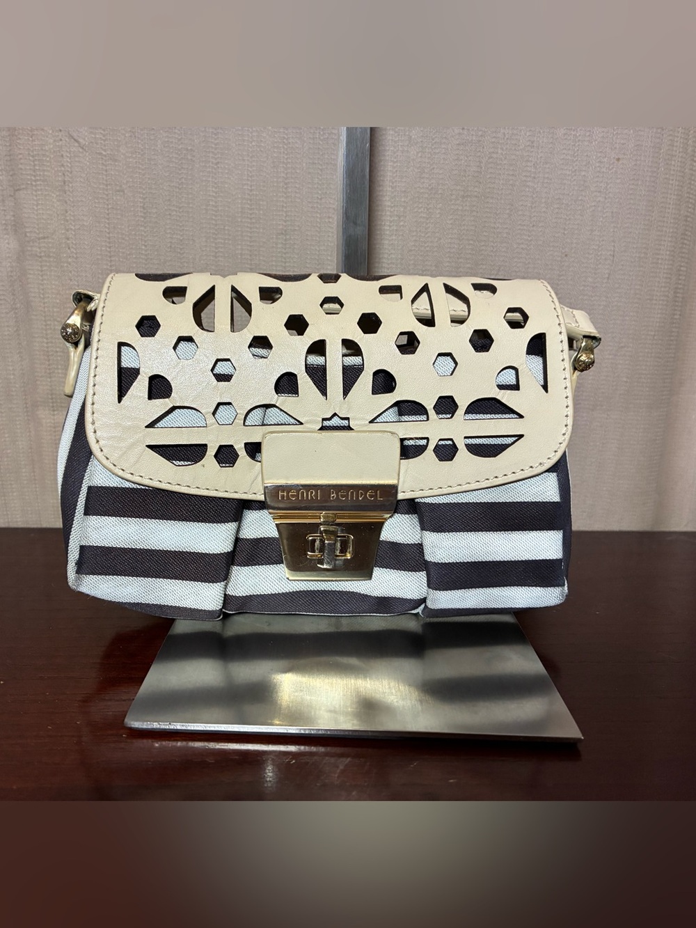 henri bendel Cream Laser-Cut Flap with Black & White Stripe Crossbody